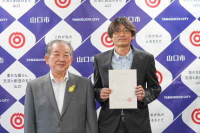 永田さんと市長の写真